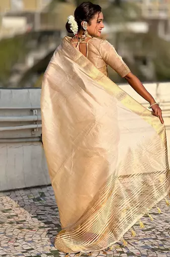 Cream woven design tissue tussar saree