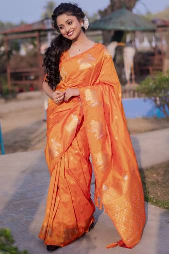 Orange woven design zari silk blend banarasi saree
