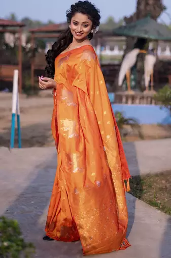Orange woven design zari silk blend banarasi saree