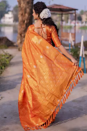 Orange woven design zari silk blend banarasi saree
