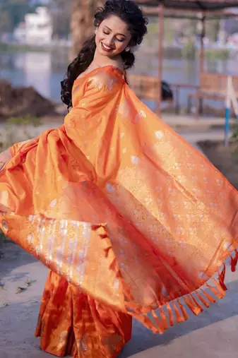 Orange woven design zari silk blend banarasi saree