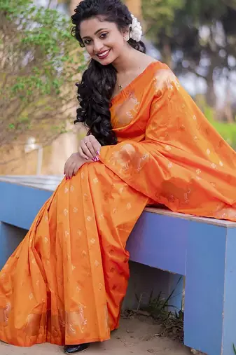 Orange woven design zari silk blend banarasi saree