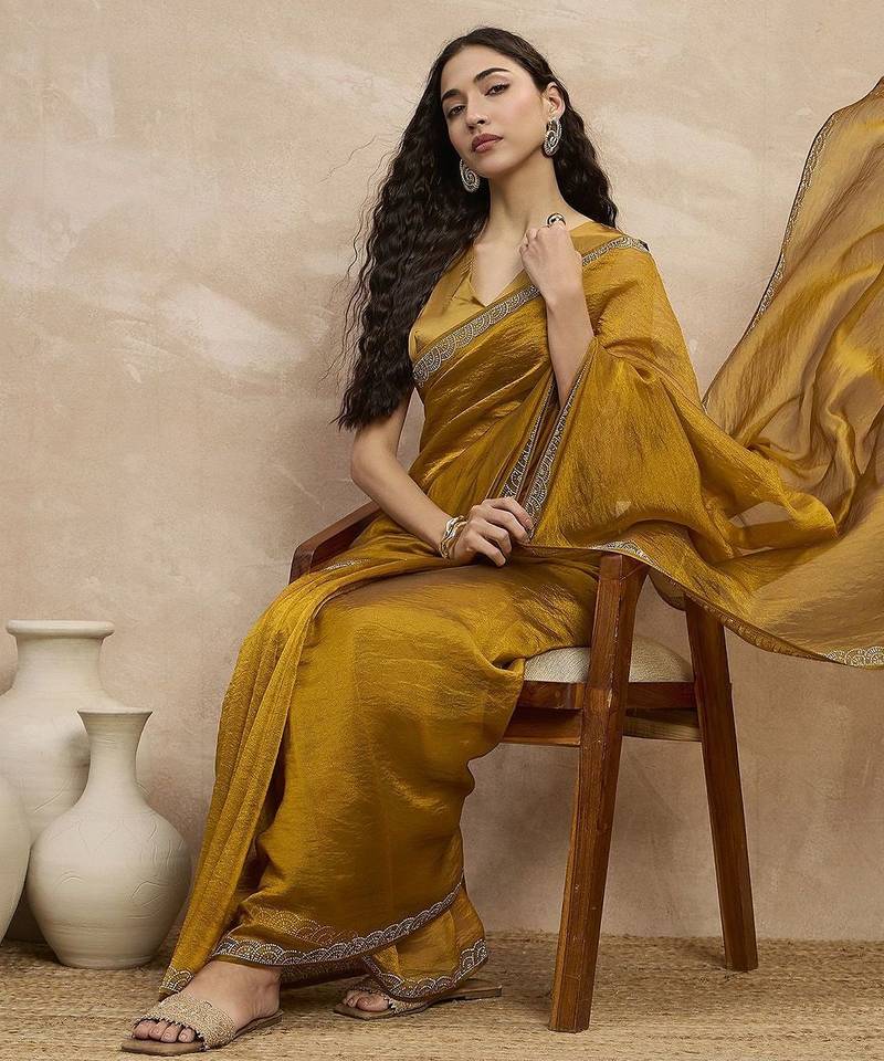 Mustard organza solid with stone work border saree with unstitched blouse piece