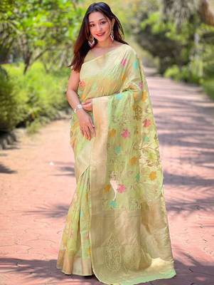 Green woven design zari silk blend banarasi saree 1
