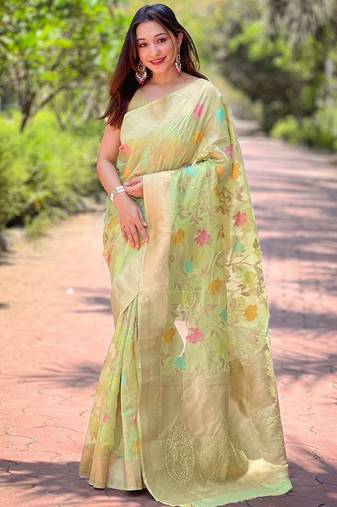 Green woven design zari silk blend banarasi saree