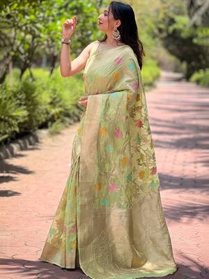 Green woven design zari silk blend banarasi saree 2