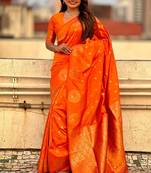 Orange ethnic motifs woven design zari banarasi saree