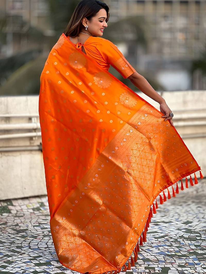 Orange ethnic motifs woven design zari banarasi saree