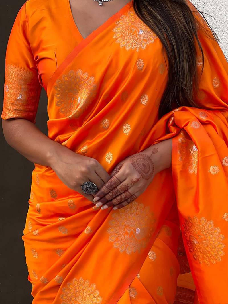 Orange ethnic motifs woven design zari banarasi saree