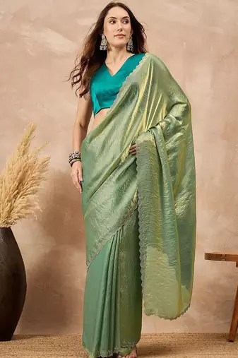 Green solid green embellished beads and stones border satin saree
