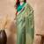 Green solid green embellished beads and stones border satin saree