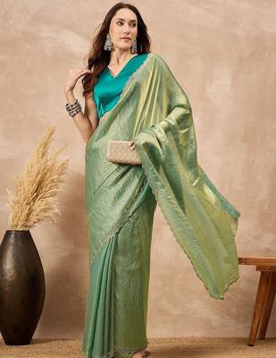 Green solid green embellished beads and stones border satin saree 4