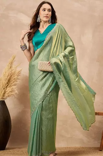 Green solid green embellished beads and stones border satin saree