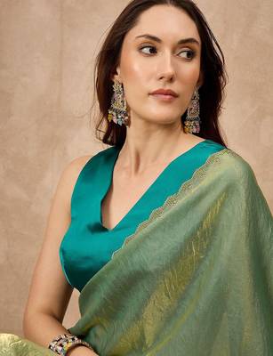 Green solid green embellished beads and stones border satin saree 5