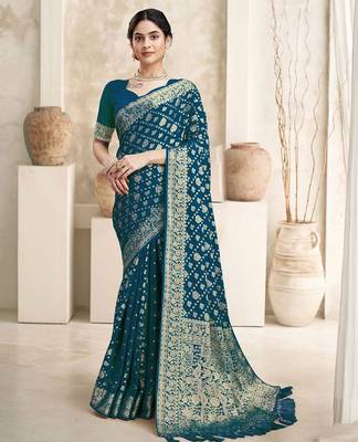 Turquoise woven design zari  georgette saree 1