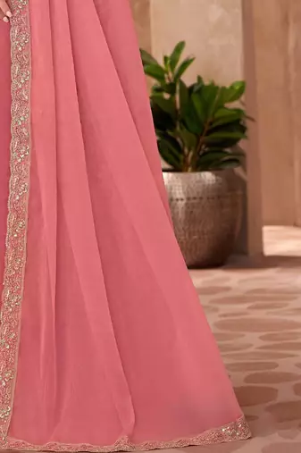 Peach sequinned  georgette saree