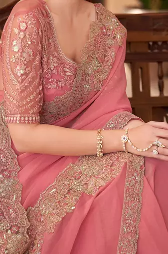 Peach sequinned  georgette saree