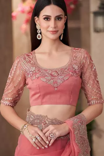 Peach sequinned  georgette saree