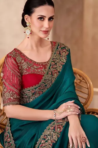 Teal embellished sequinned  chiffon saree