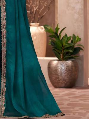 Teal embellished sequinned  chiffon saree 4