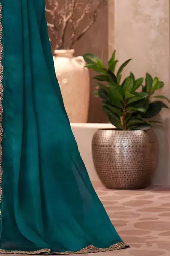 Teal embellished sequinned  chiffon saree