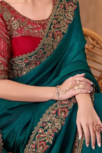 Teal embellished sequinned  chiffon saree