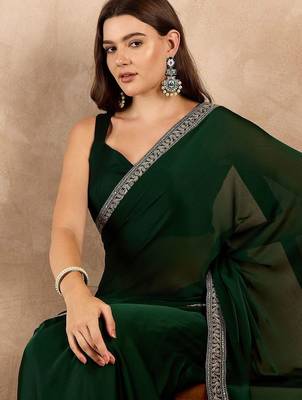 Green zari embroidered solid satin saree 5