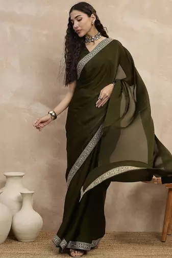 Green embroidered lace border satin saree with unstitched blouse piece