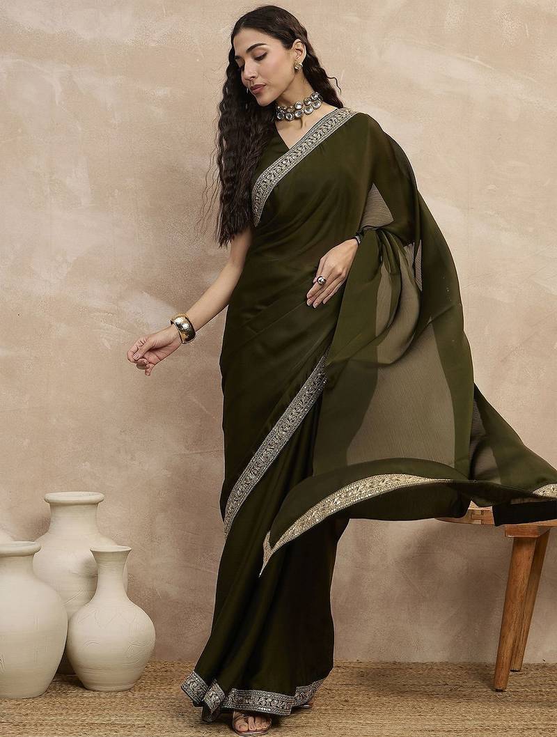 Green embroidered lace border satin saree with unstitched blouse piece