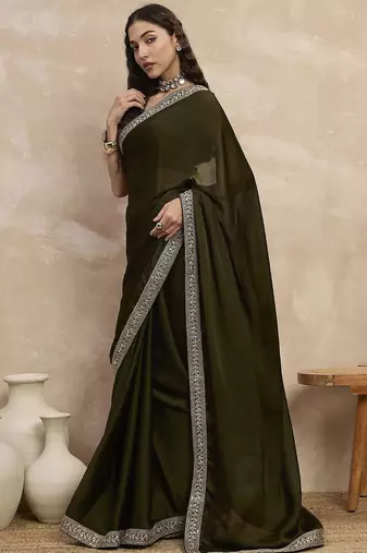 Green embroidered lace border satin saree with unstitched blouse piece
