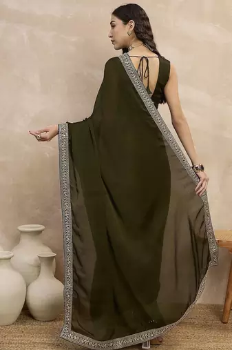 Green embroidered lace border satin saree with unstitched blouse piece