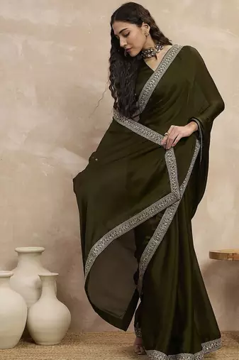 Green embroidered lace border satin saree with unstitched blouse piece