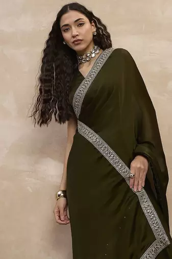 Green embroidered lace border satin saree with unstitched blouse piece