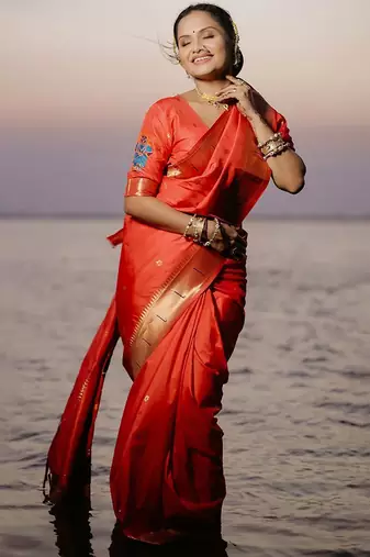 Red woven design zari paithani saree