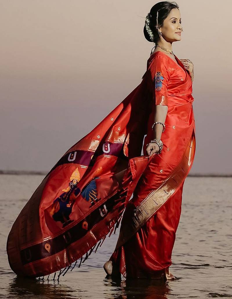 Red woven design zari paithani saree
