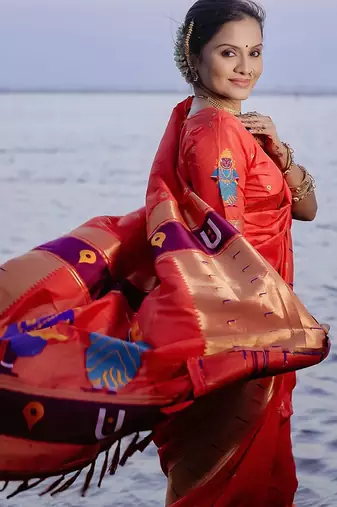 Red woven design zari paithani saree