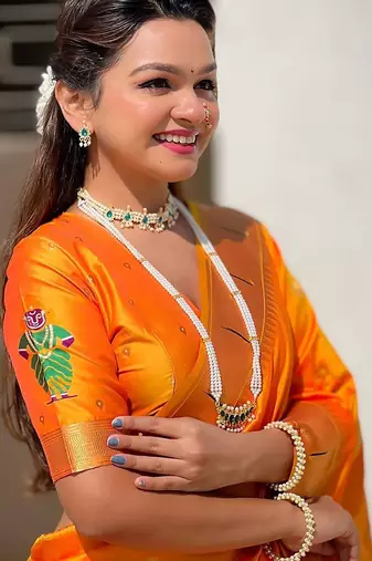 Yellow ethnic motifs silk blend paithani saree