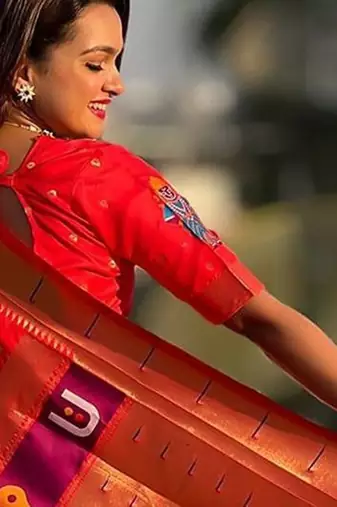Red woven design zari silk blend paithani saree