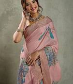 Pink ethnic motifs zari tissue saree with unstitched blouse piece