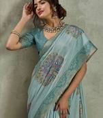 Sea green ethnic motifs sequinned tissue saree