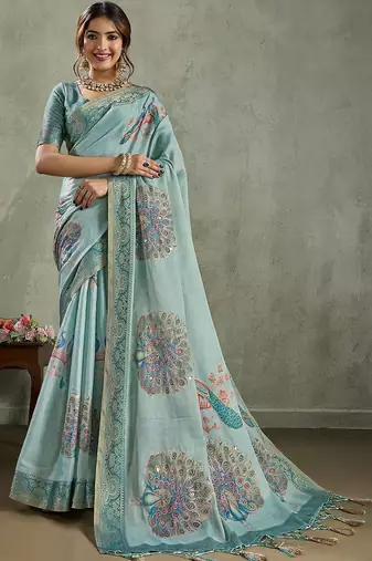 Sea green ethnic motifs sequinned tissue saree