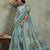 Sea green ethnic motifs sequinned tissue saree