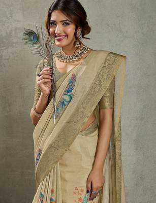 Beige ethnic motifs woven design zari tissue saree 1