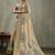 Beige ethnic motifs woven design zari tissue saree