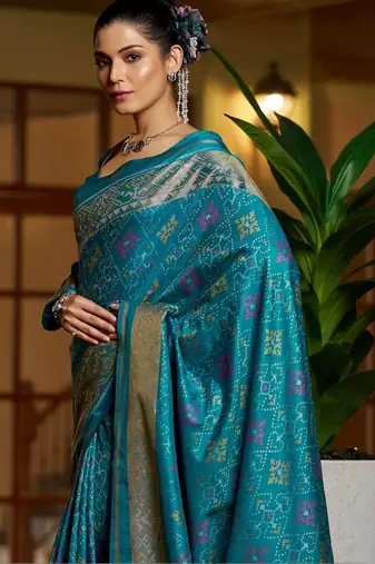 Teal floral zari silk blend designer patola saree