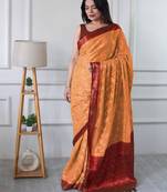 Peach woven design zari  georgette banarasi saree