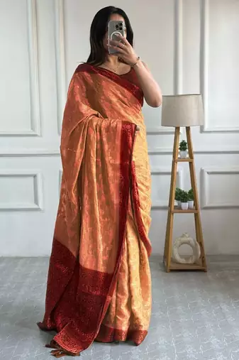 Peach woven design zari  georgette banarasi saree