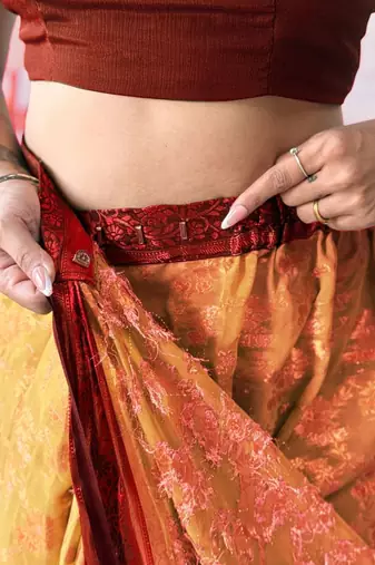 Peach woven design zari  georgette banarasi saree