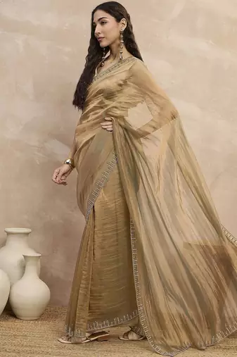 Beige solid beads and stones embellished organza saree with unstitched blouse
