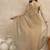 Beige solid beads and stones embellished organza saree with unstitched blouse